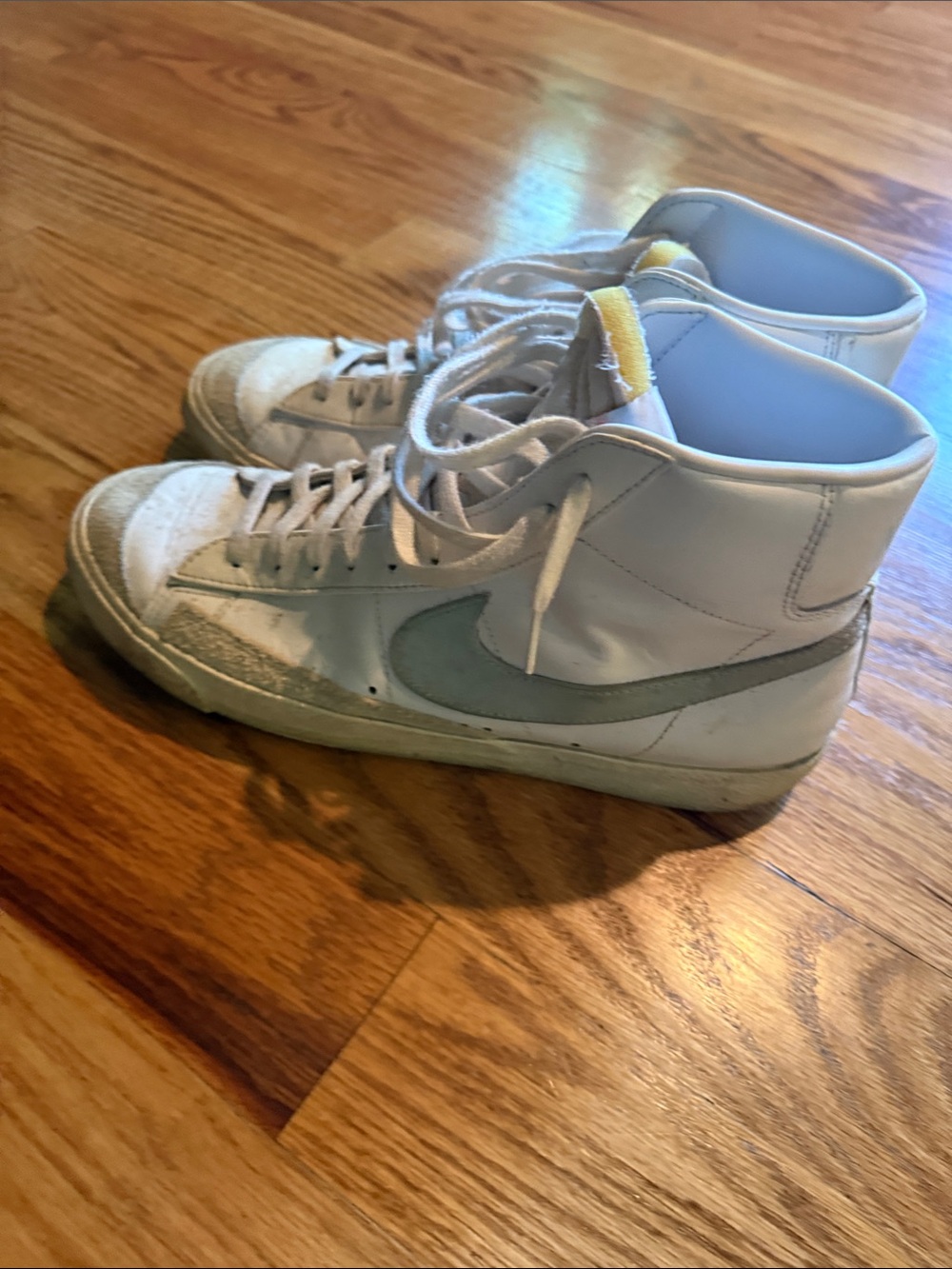 Nike Kids High-Top Sneakers in White with Light Blue Swoosh
